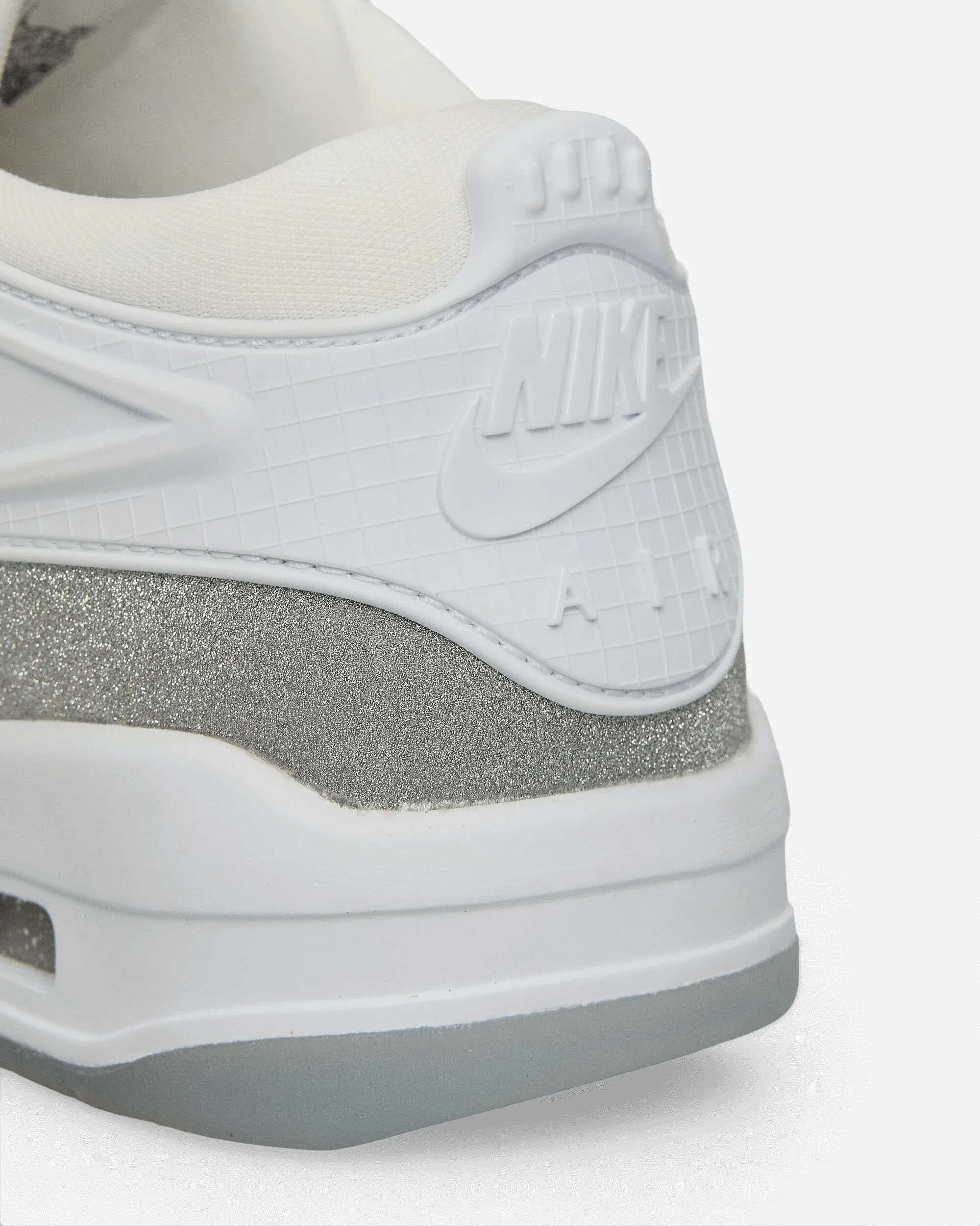Women's Air Jordan 4 RM Sneakers White / Metallic Silver